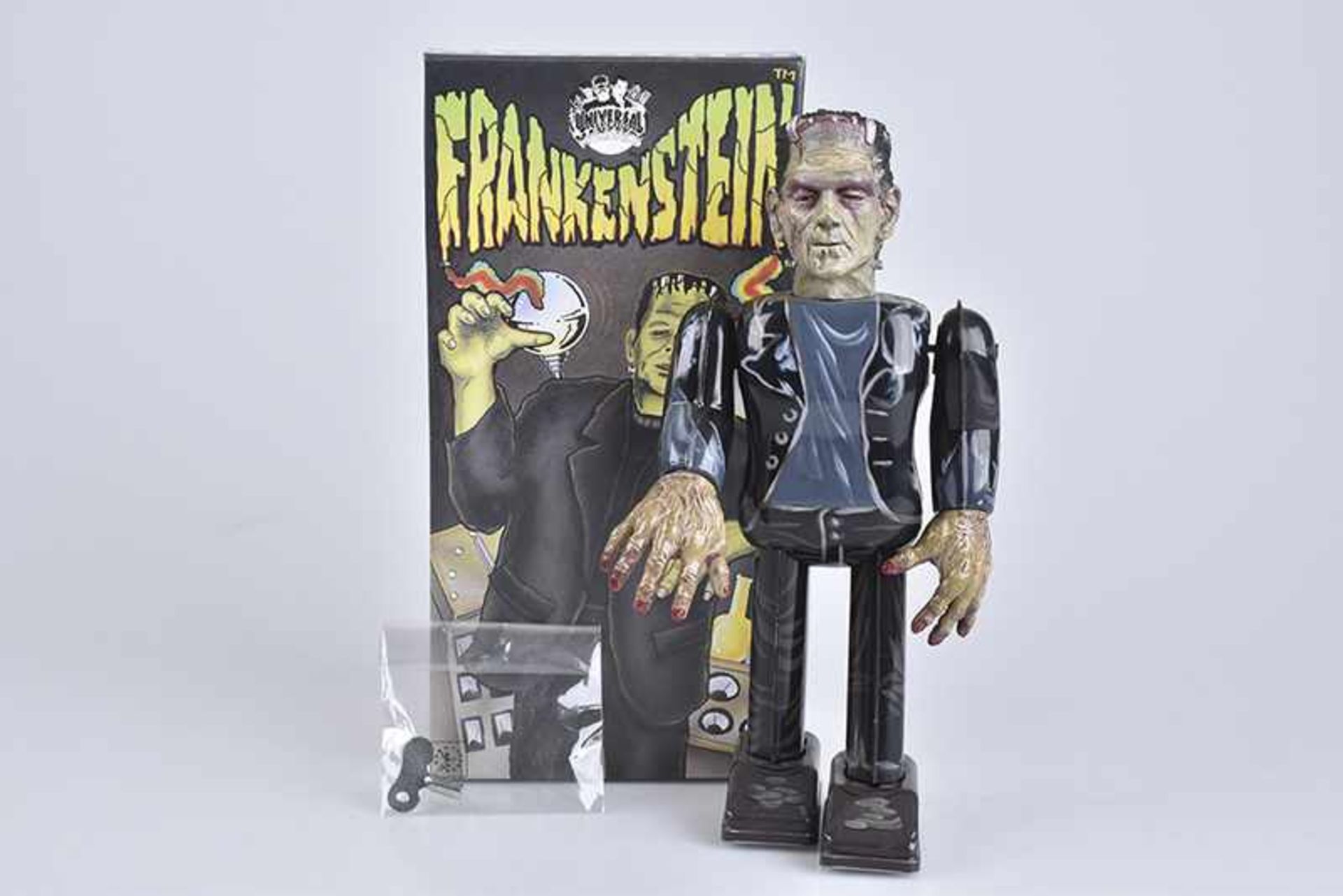 TM Frankenstein, Made in Japan, Blech/ Kunststoffkopf, lithographiert, H 24 cm, Uhrwerk ff., Z 1,