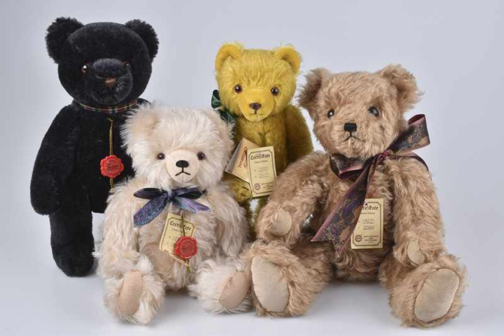HERMANN 4 Teddys, mit Schild, Mohair, beige, curry, schwarz, braun, 5-fach gegliedert, 28-38 cm,