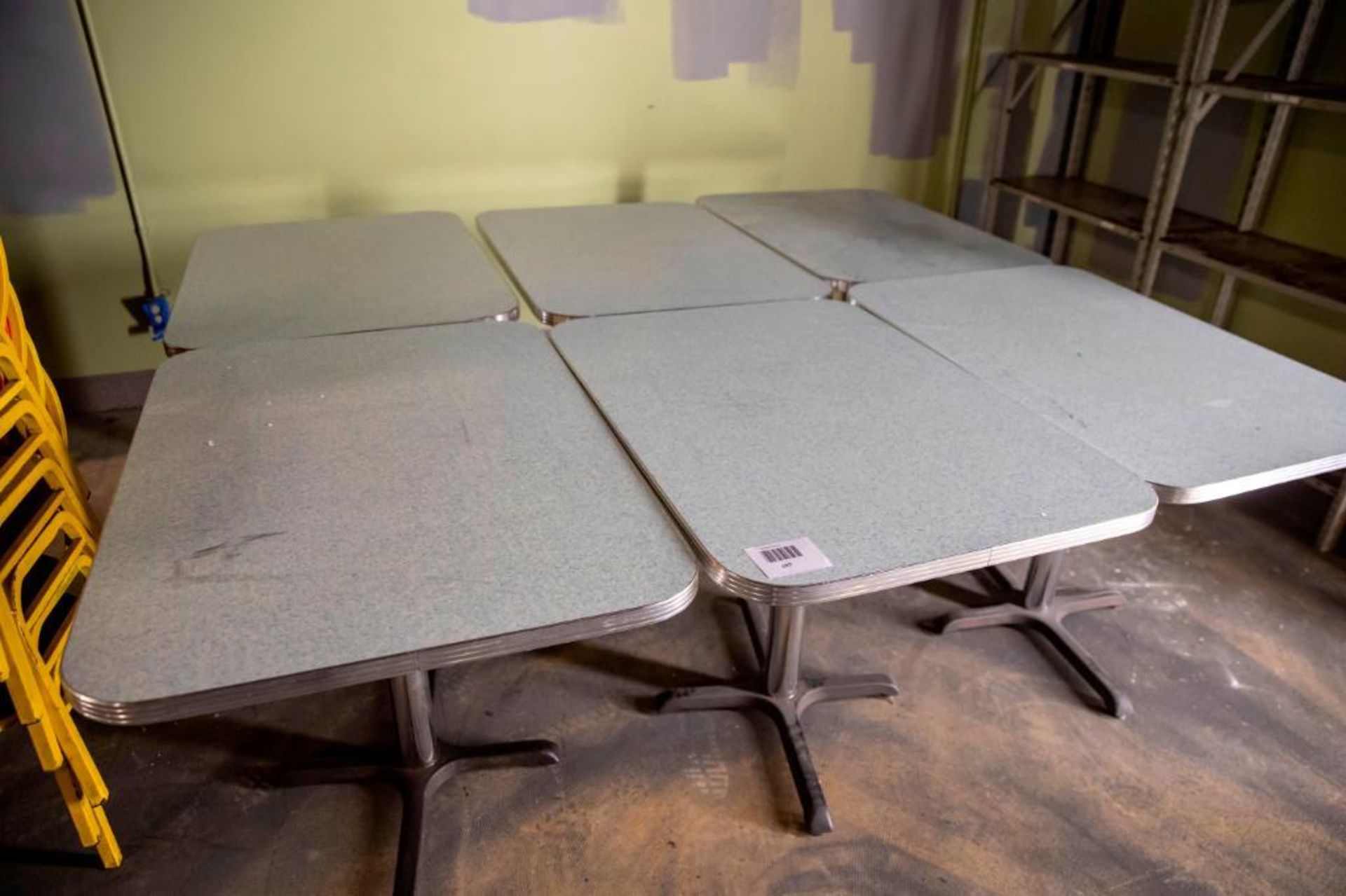 6 heavy duty dining tables. Used, shows commercial use. See pictures.