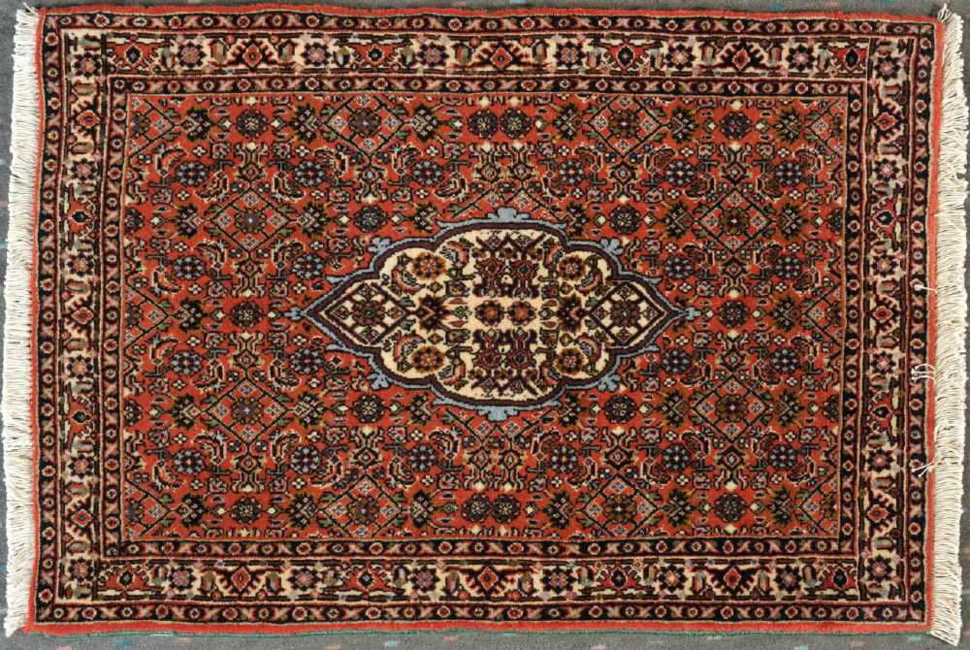 Herati-Bidjar, Persien, 63 x 81 cmälter, Wolle, feine Knüpfung, rotgrundig, mehrfarb. Mittelstück,