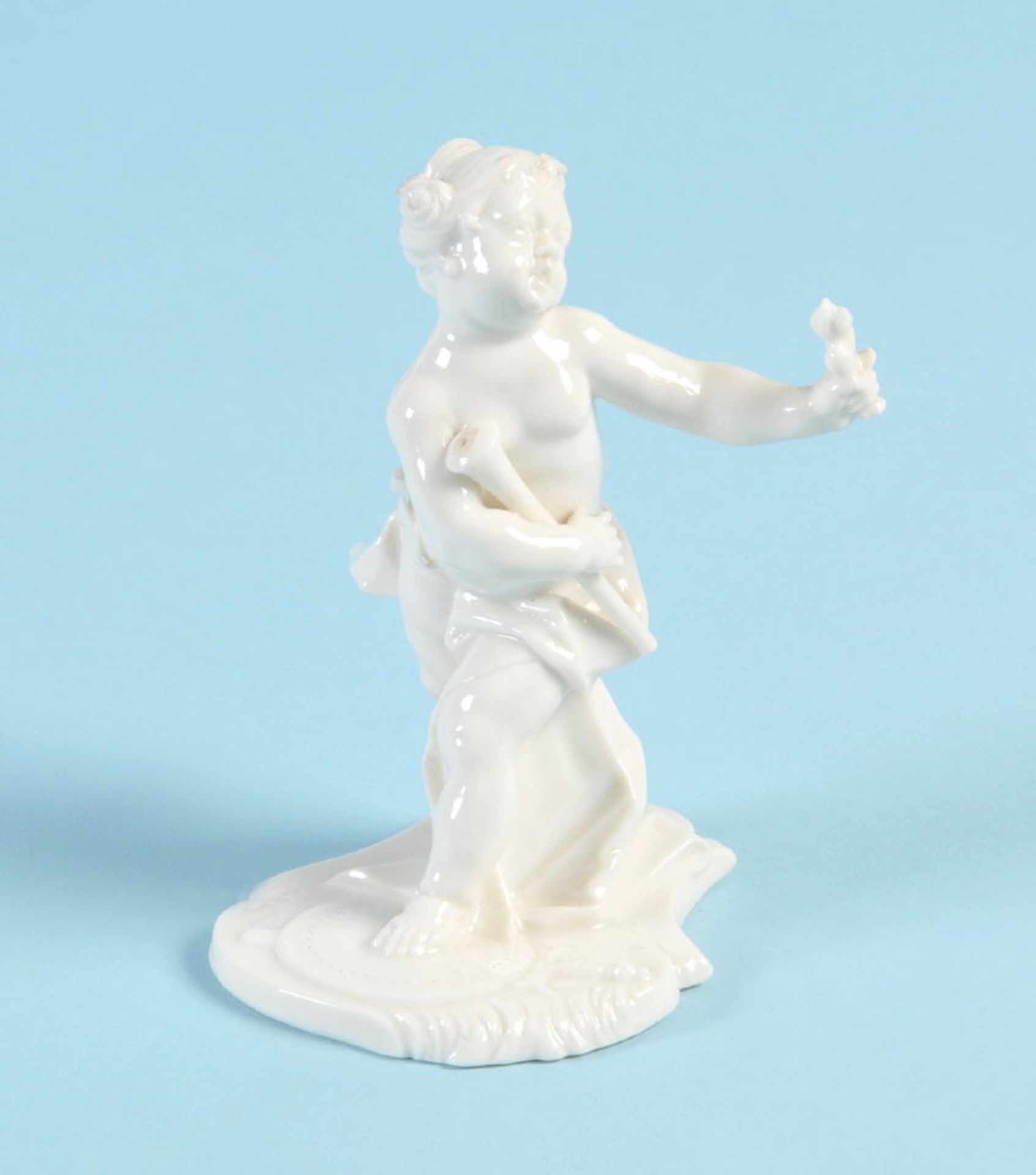 Figur - Putto als Venus "Nymphenburg"Porzellan, weiß, auf geschw. Sockelplatte, H= 10,5 cm, Modell-