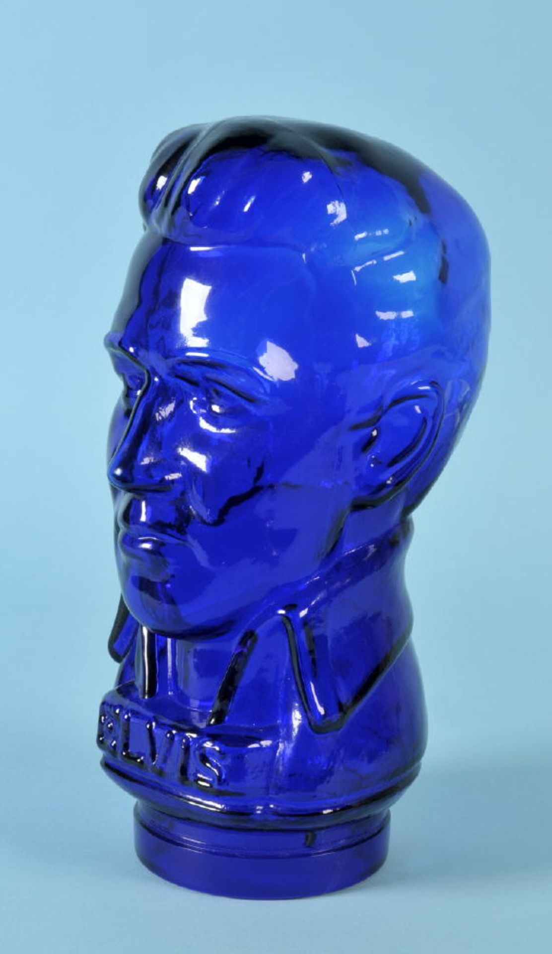 Elvis-Kopffarbloses Pressglas, blauer Überfang, H= 30 cm