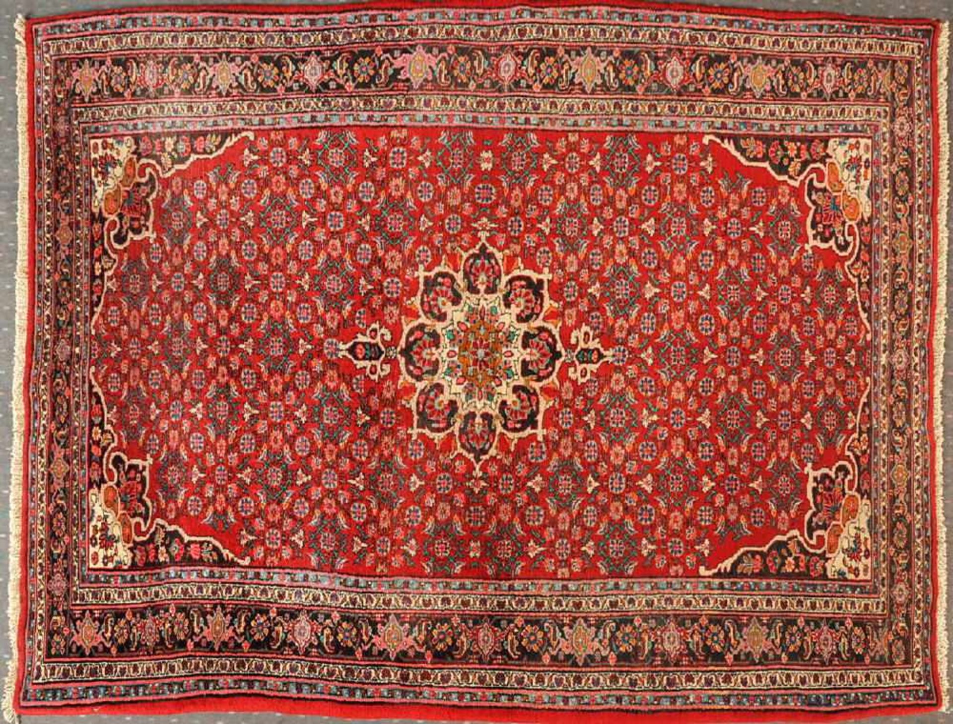 Herati-Bidjar, Persien, 140 x 218 cmalt, Wolle, feine Knüpfung, rotgrundig, mehrfarb. Medaillon,