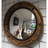 Convex mirror with gilt frame