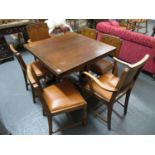 Extending dining table with 6 chairs