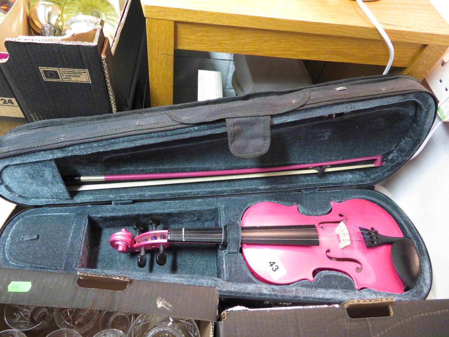 Pink student violin with bow and case