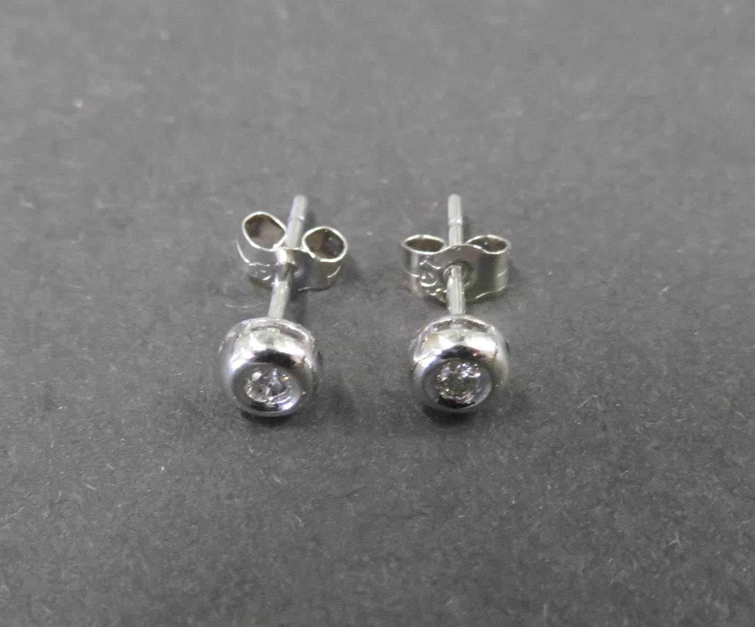 18ct and diamond earrings