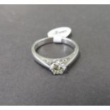 18ct 750 white gold .6 diamond ring