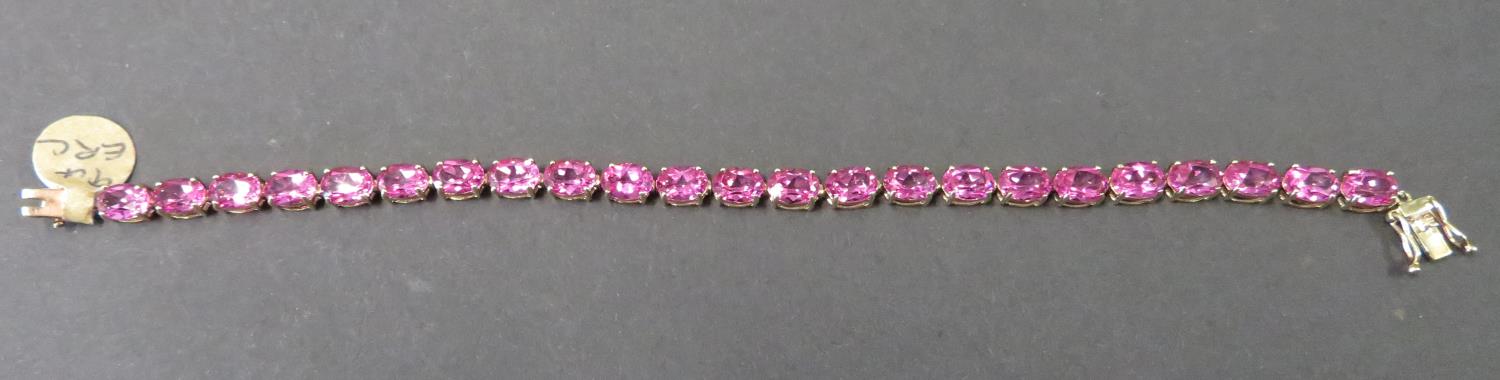 9ct tennis bracelet - unknown pink stones