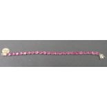 9ct tennis bracelet - unknown pink stones