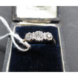 Victorian 18ct gold platinum ring set with three old mine cut diamonds total weight of half a carat