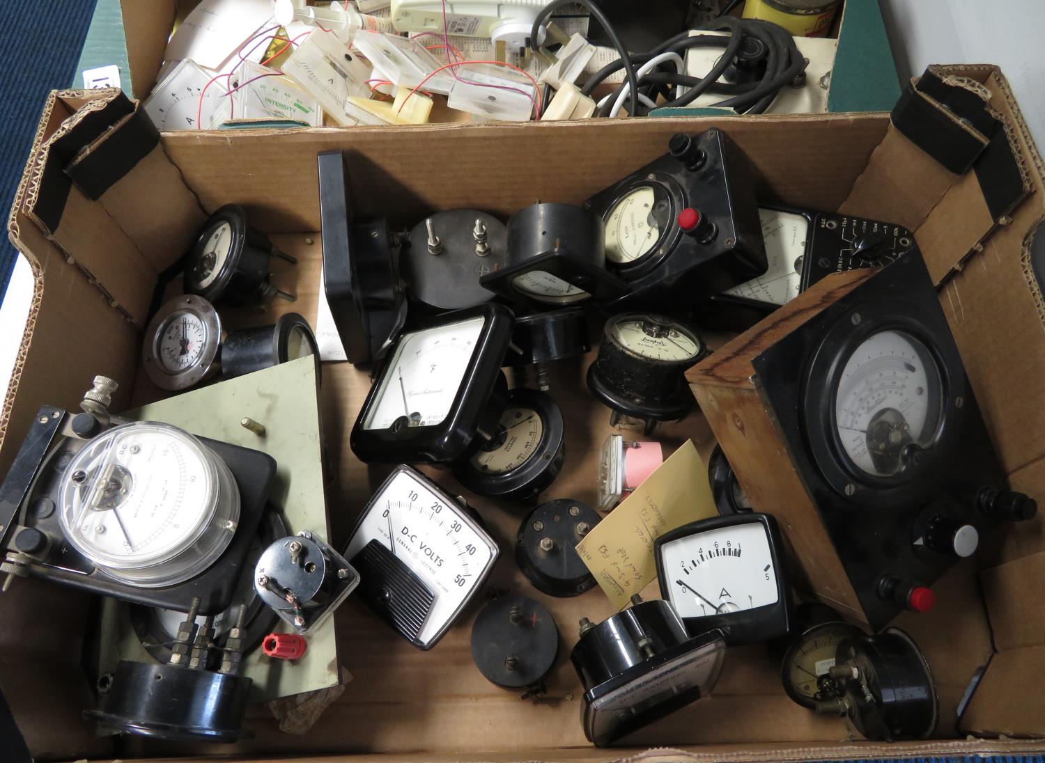 Large box of Ampmeters, Voltmeters and other meters