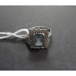 Vintage 18ct white gold ring set with large aquamarine and 18 brilliant cut diamonds