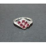 Pretty silver and garnet set ring