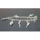 Sterling silver bracelet with six charms. 19g