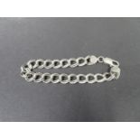 Lady's silver double link curb bracelet. Fully hallmarked. Weight 7g