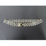 8" Silver and gold on silver hallmarked bracelet. Weight 13g