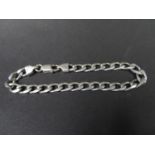 Gentleman's solid silver curb link bracelet. Length 8 1/2", Weight 18g