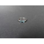 Silver 'bowtie' ring set with blue zircon stones