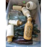 Box of old glass bottles and stone bottles