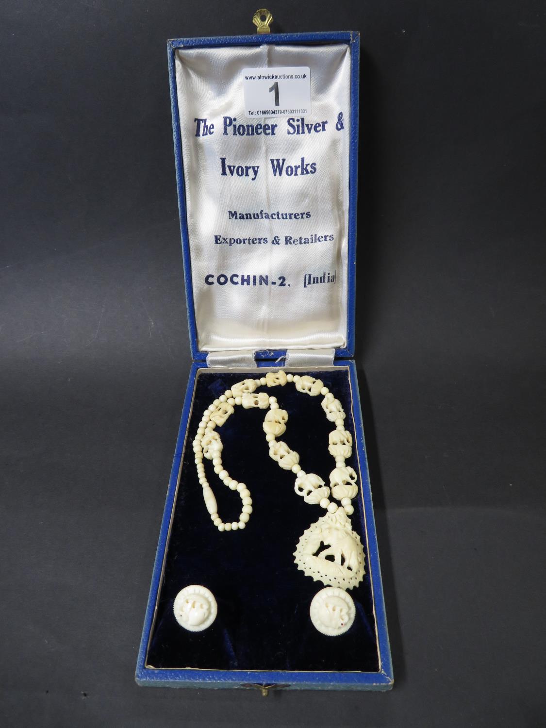 Bone necklace and earrings