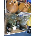 Box of old bottles and 2 large stone bottles