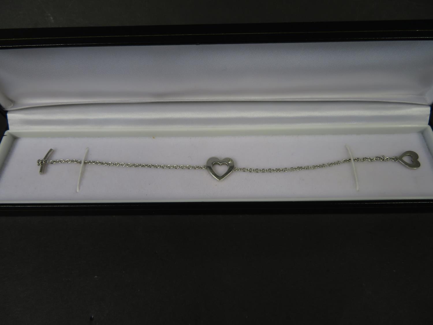 Silver heart bracelet by 'hot diamonds' set with a small natural brilliant cut diamond