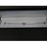 Silver heart bracelet by 'hot diamonds' set with a small natural brilliant cut diamond