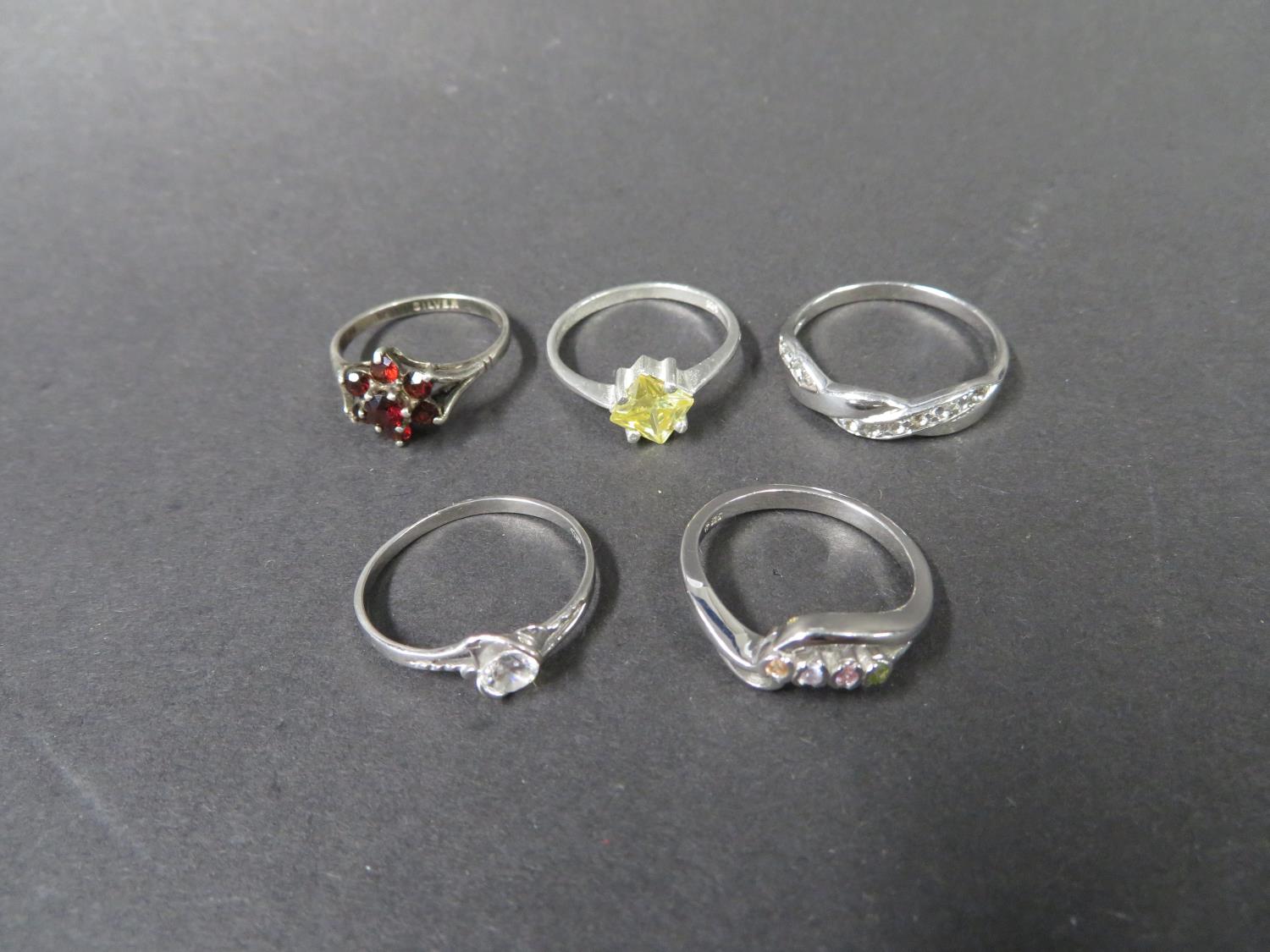 Five silver dress rings. Weight 9g