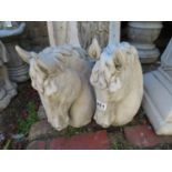 Pair of concrete horse heads