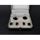 Gentleman's silver and enamel dress set. Consists of cuff links and 4 shirt studs.