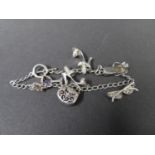 Modern silver charm bracelet, Fully hallmarked. Weight 15g