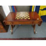 Desk sofa table with reversible chess table and brass chess pieces