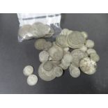 Silver coins weighing 165 grams plus other coins not included in weight