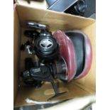 Box of fishing reels and fishing weights