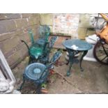 Heavy cast iron table with four chairs
