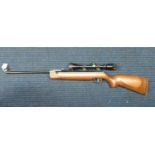 Air rifle with scope