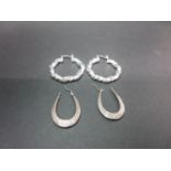 2x pairs of silver hoop earrings stamped 925 14 grams