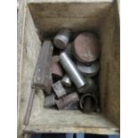 Box containing metal discs