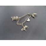 Vintage silver charm bracelet stamped silver 3 charms 13grams