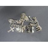 Vintage silver charm bracelet 14 charms Birmingham 53 grams