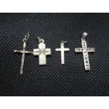 Set of four silver crosses .5g, .5g, 1.5g and .5g