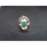 Silver gothic ring with green stone