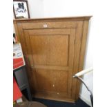 3' x 4.5' oak corner cabinet with locking key