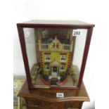 Victorian glass case diorama of a house 12" x 14"