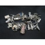 Vintage silver figaro link bracelet with 30 charms 79 grams