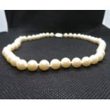 String of full pearls with gold on silver clasp
