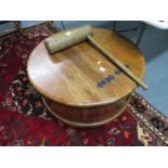 Round barrelled flip top coffee table