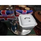 Plated tray, blue glass oil lamp and white enamel bread box