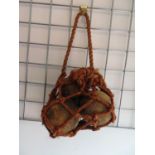 Bag containing wooden coconut shy balls